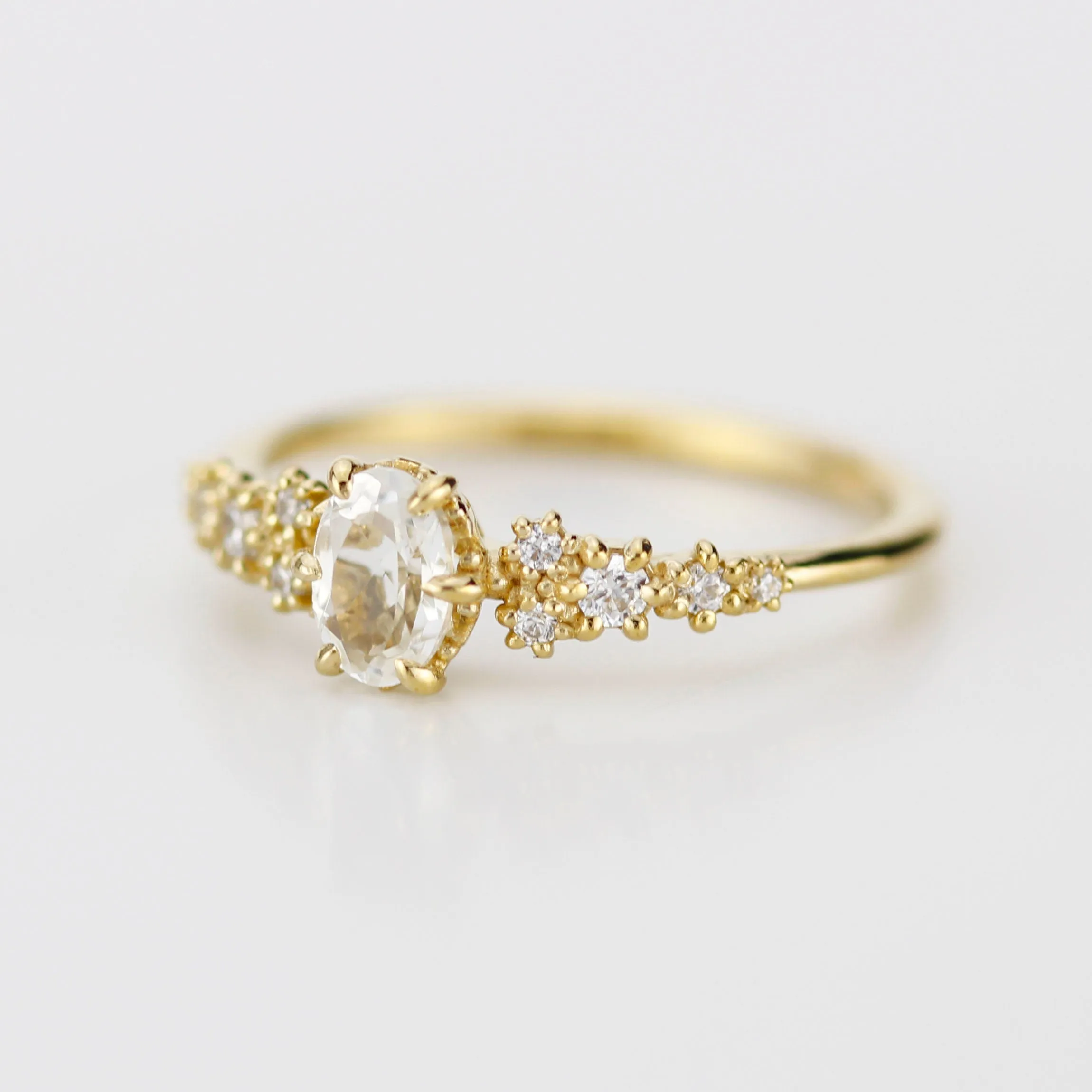 6x4 oval topaz ring and diamond engagement ring