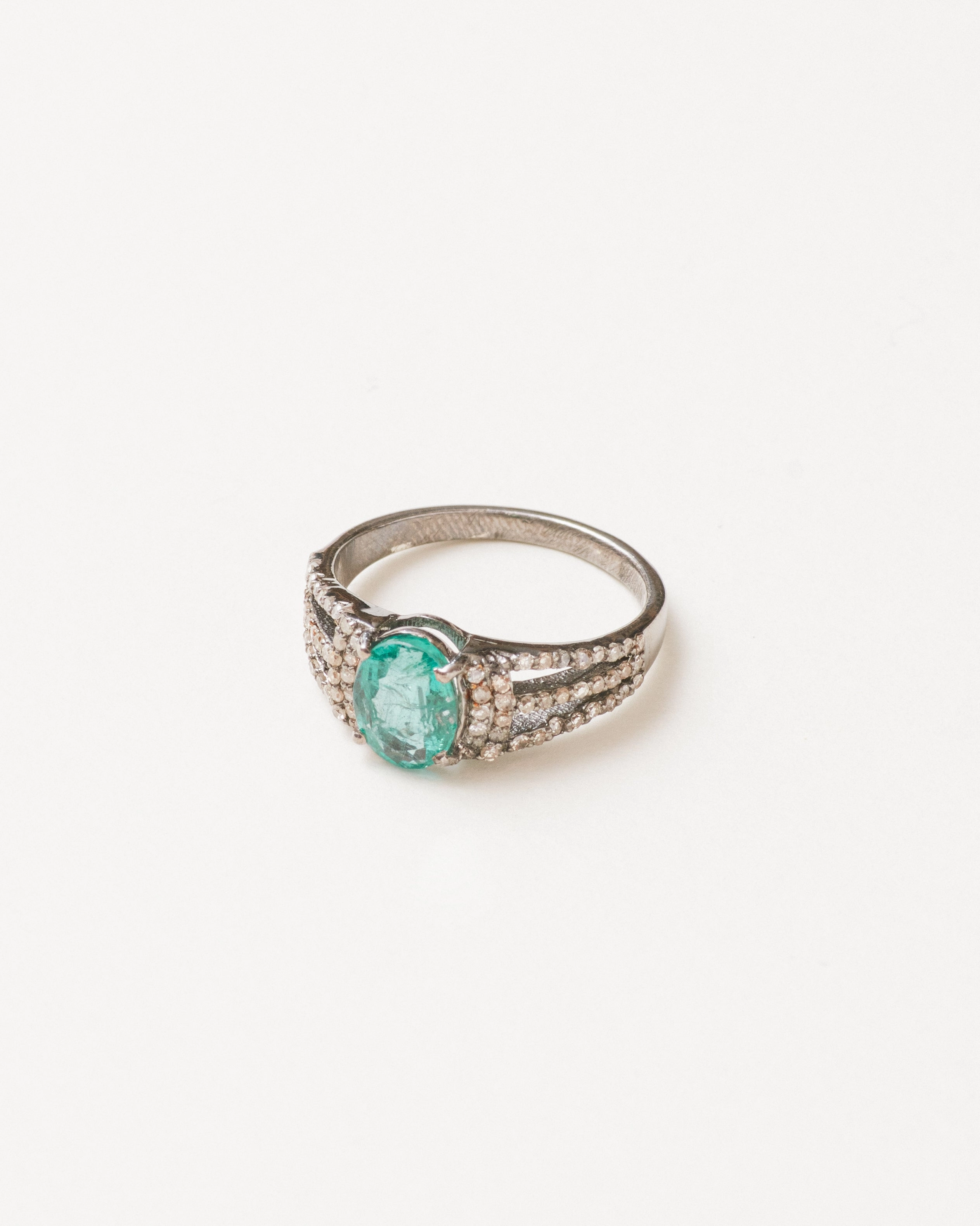 Emerald and diamond statement ring