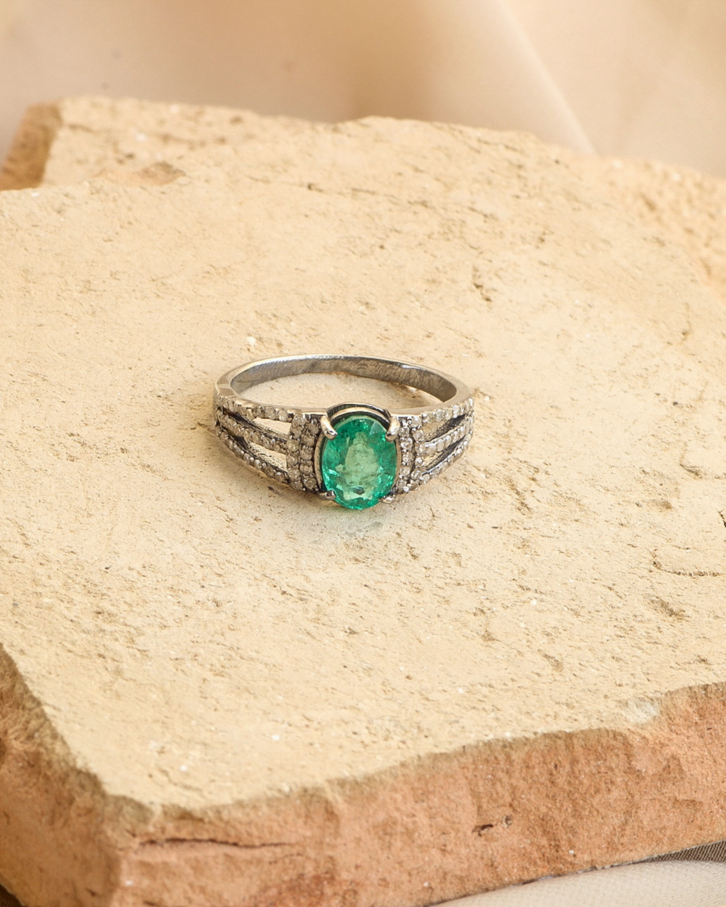 Emerald and diamond statement ring