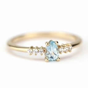 engagement ring blue topaz and diamond pear shaped tear drops