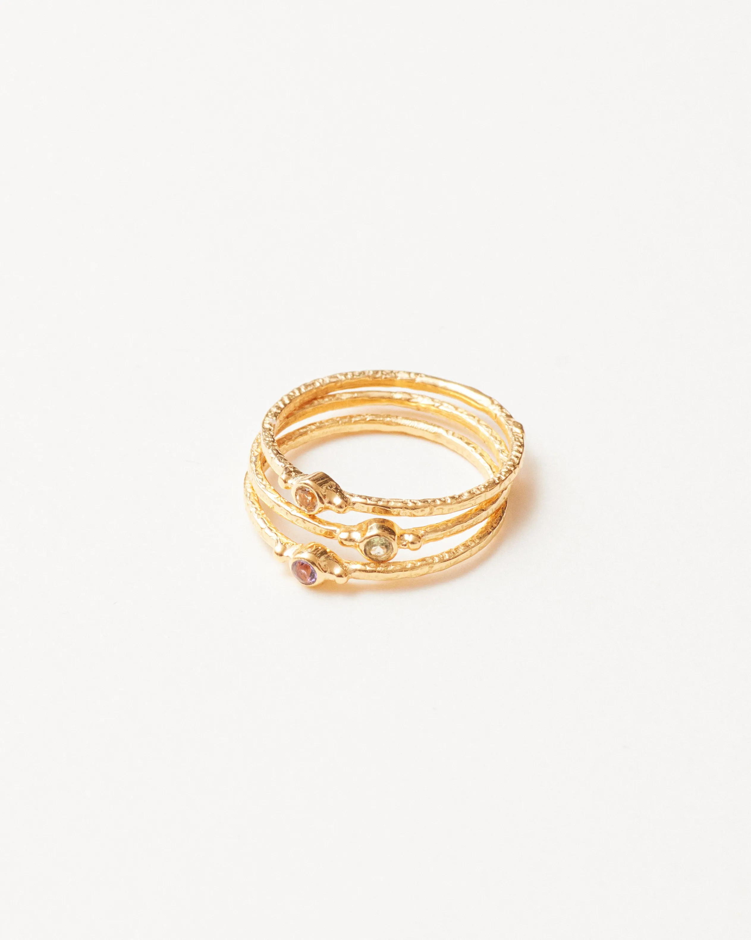 Gold vermeil circular multi-stone stacking ring trio