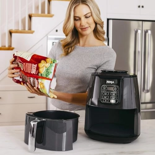 Ninja Air Fryer, 1550-Watt Programmable Base for Air Frying, Roasting, Reheating & Dehydrating with 4-Quart Ceramic Coated Basket (AF101), Black/Gray (Renewed)