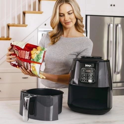 Ninja Air Fryer, 1550-Watt Programmable Base for Air Frying, Roasting, Reheating & Dehydrating with 4-Quart Ceramic Coated Basket (AF101), Black/Gray (Renewed)
